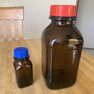 Two  Glass Square Amber Bottles w/ Cap